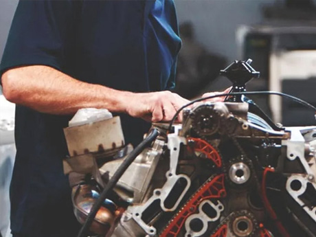 Mechanic working on engine