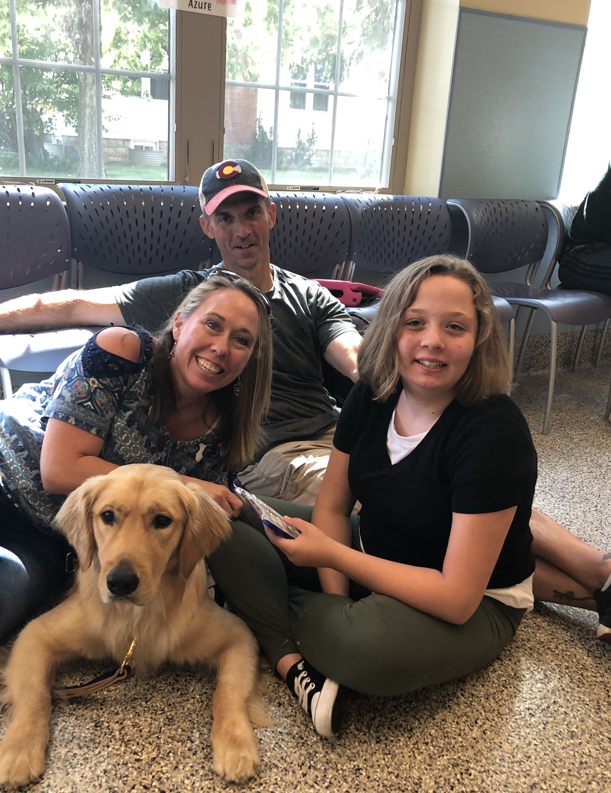 Family with service dog